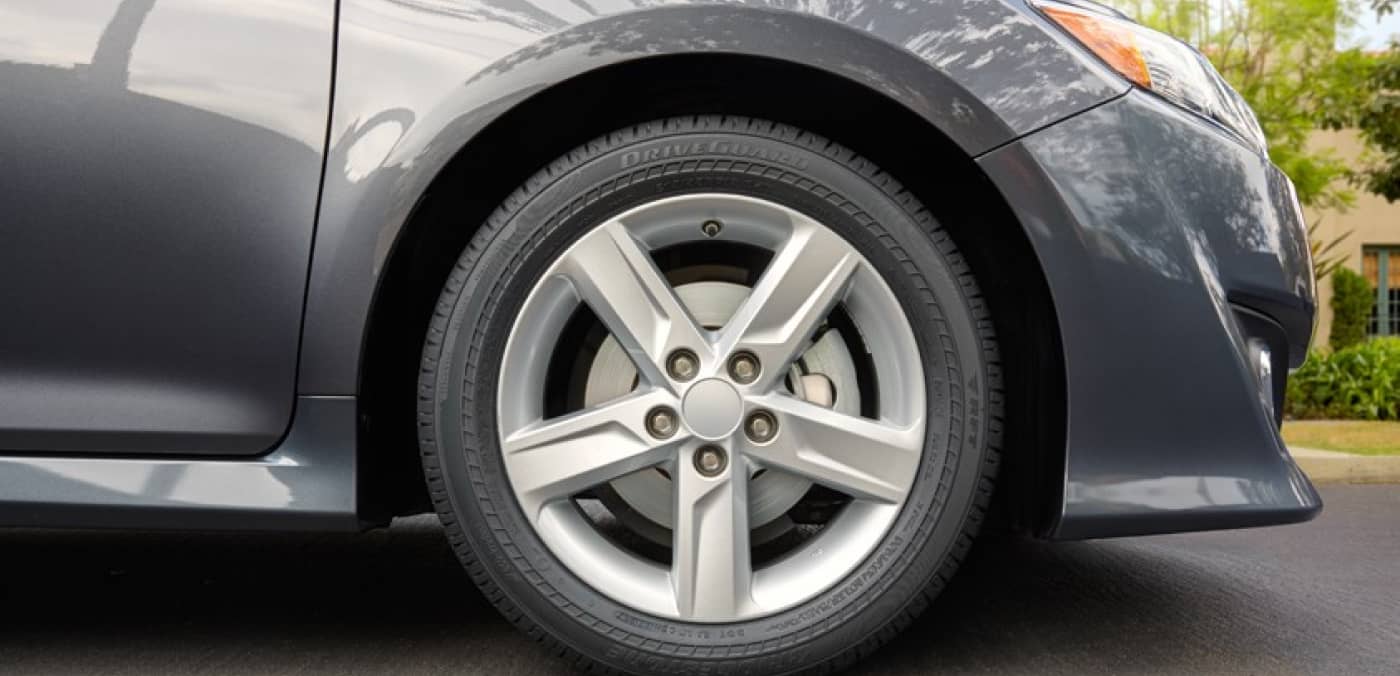 All Season Tire Side On Car