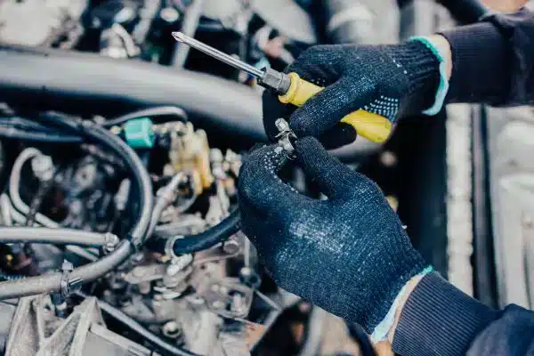 Technician testing fuel pressure at Freedom Tire Apopka Technician testing fuel pressure at Freedom Tire Apopka